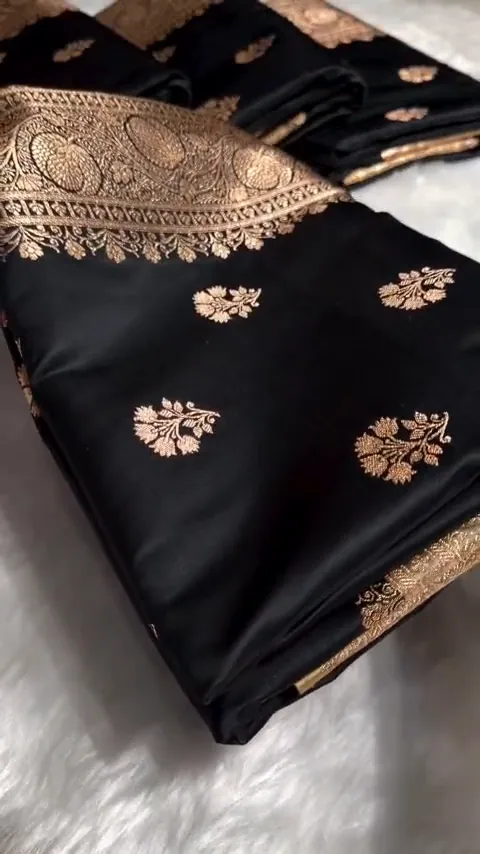 Video of the black & antique gold banarasi mashru silk butta saree showing the drape and zari